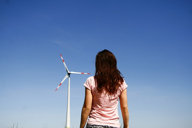windmill, young woman, sky