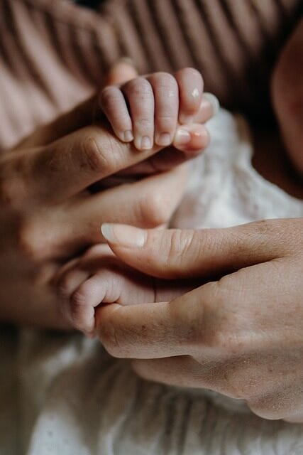 mother, baby, hands