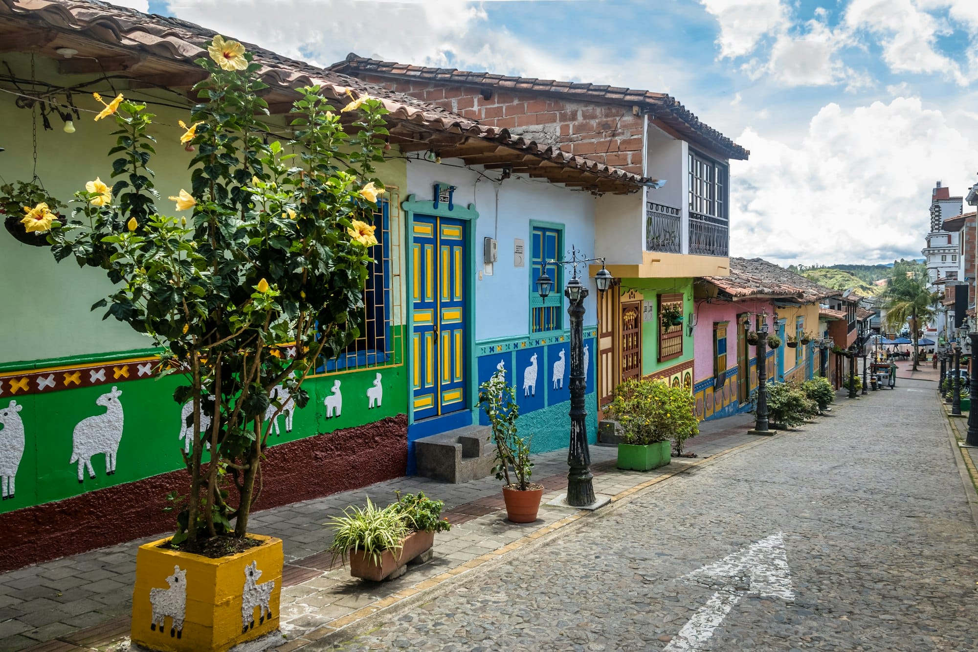 Colorful houses on a cobblestone street - Guatape, Antioquia, Colombia